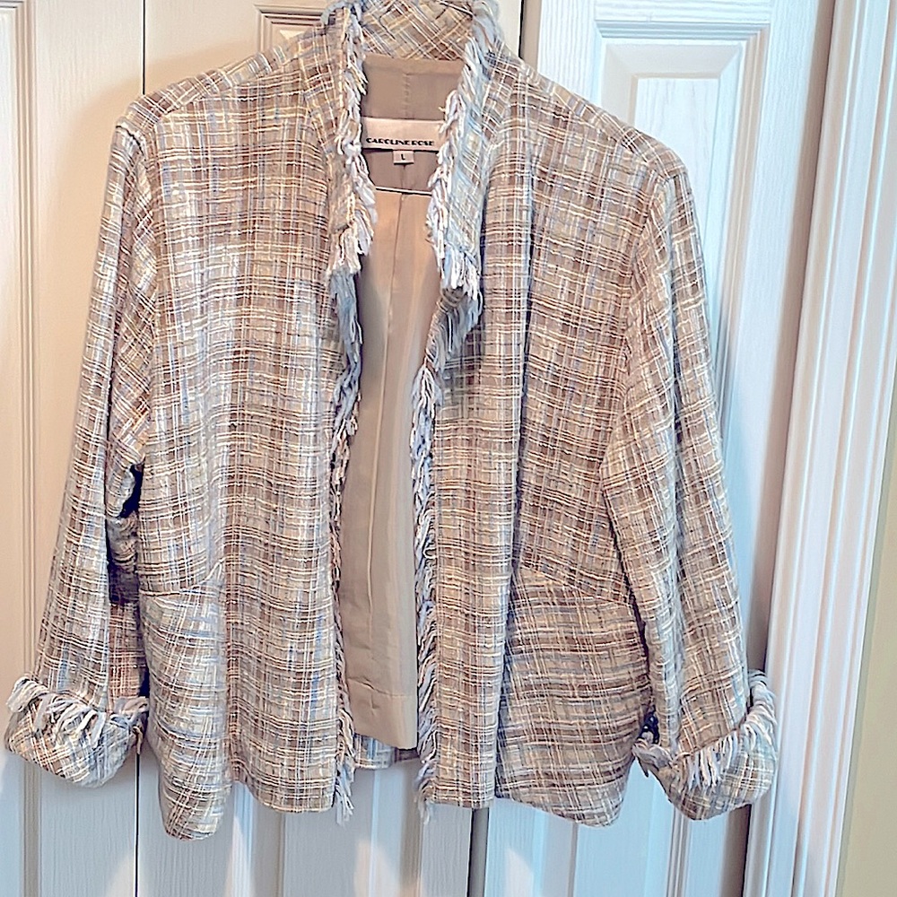 Soft muted pale blue and beige jacket.